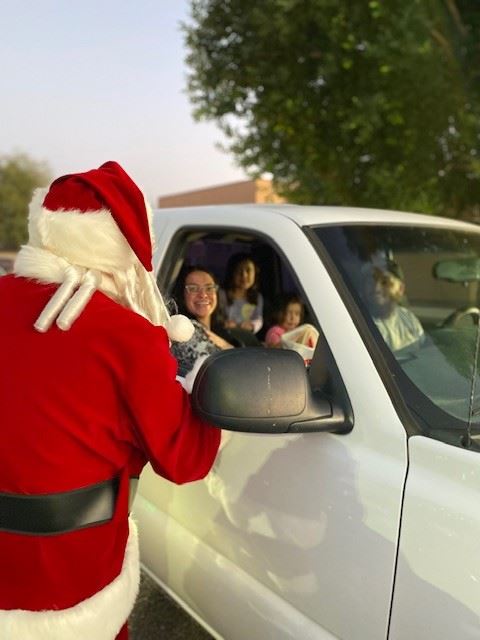 Santa and smiling Mom