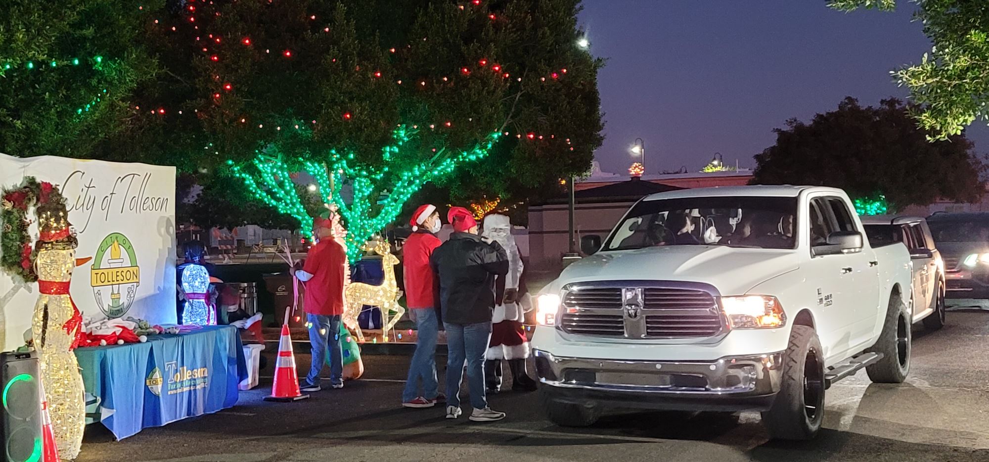 Staff and Santa Greeting Community